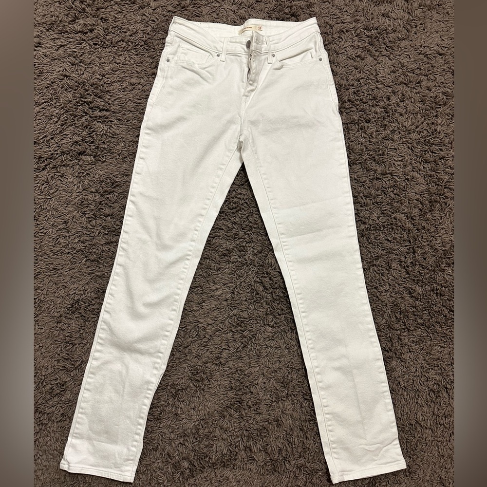 Women mid rise white skinny jeans size 28